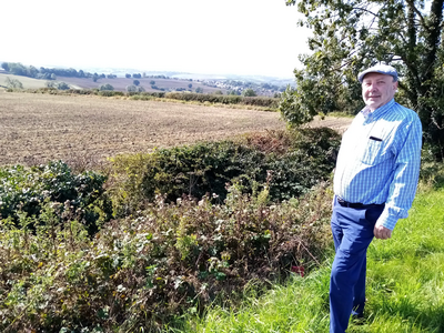 Cllr Paul Jacobs at the site of the proposed new housing development